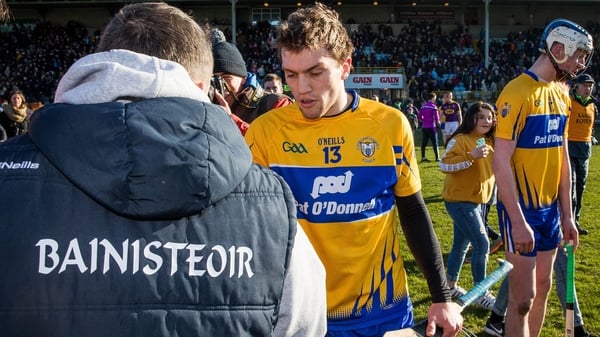 Davy Fitzgerald shakes hands with Shane O'Donnell after the game