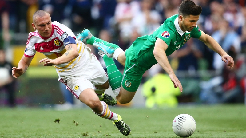 Scott Brown in action against Shane Long in 2015