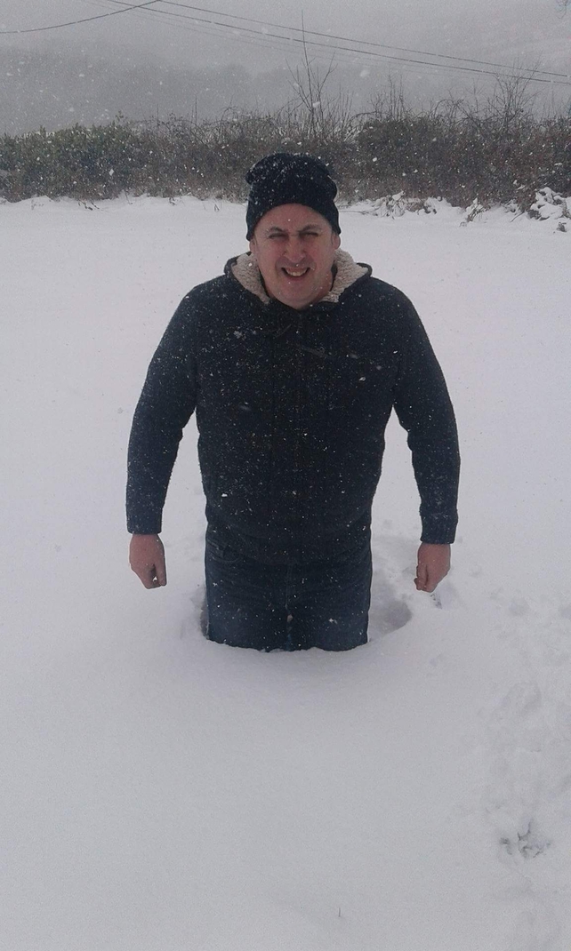 Up to his waist in snow in Knockbride, Cavan - By Adrian Kivlehan