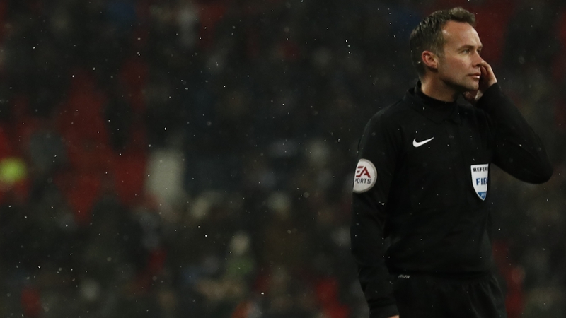 Fans in Wembley spent a lot of time watching the referee Paul Tierney touch his ear