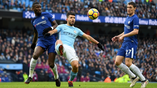 Antonio Rudiger challenges Sergio Aguero in the opening half at the Etihad Stadium
