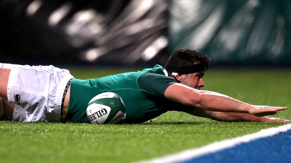 Ireland's Jack O'Sullivan scores a try