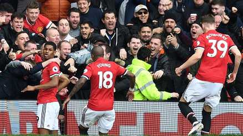 Marcus Rashford celebrates his opener with the fans