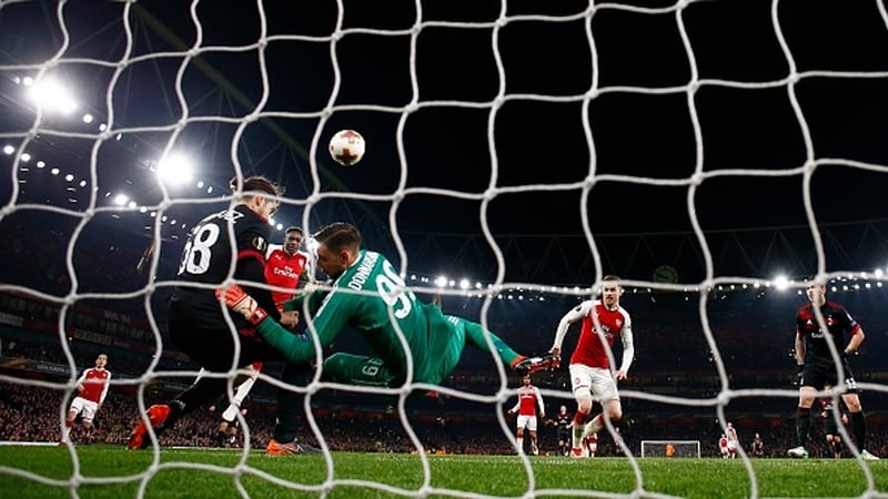 Danny Wellback heads home Arsenal's third goal
