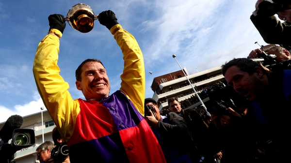 Richard Johnson celebrates with Cheltenham Gold Cup