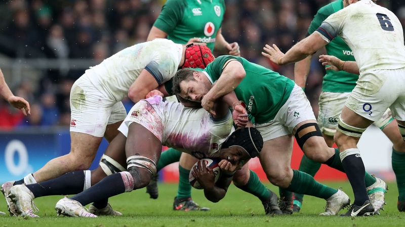 Cian Healy tackles England lock Maro Itoje
