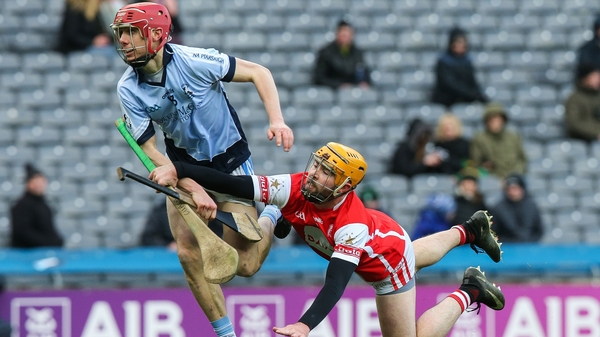 Cuala's Oisin Gough stops Adrian Breen of Na Piarsaigh
