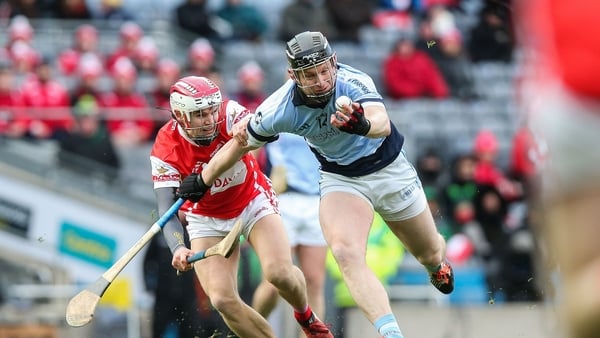 Cuala's Cian O'Callaghan with Kevin Downes of Na Piarsaigh