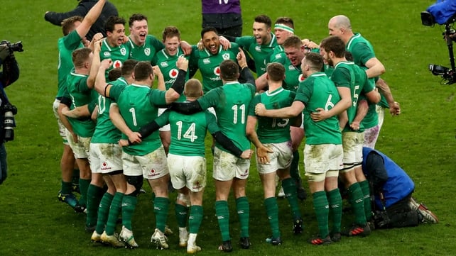 Ireland players celebrate on the pitch after the full-time whistle