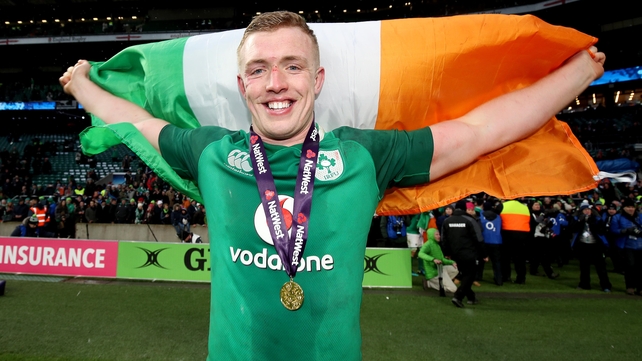 Dan Leavy drapes the Irish flag after a famous win