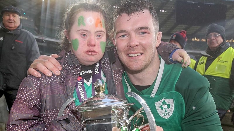 Peter O'Mahony celebrates a famous win with Jennifer Malone