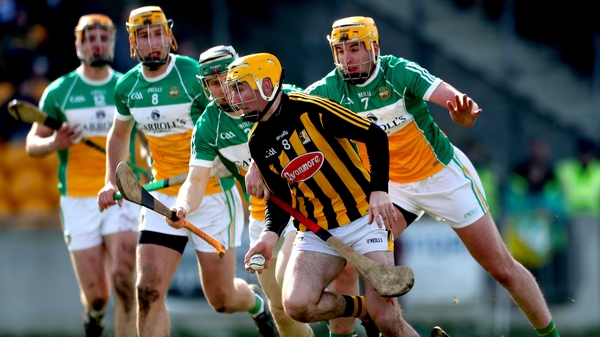 Richie Leahy is pursued by a host of defenders in Kilkenny's two-point win over Offaly in O'Connor Park
