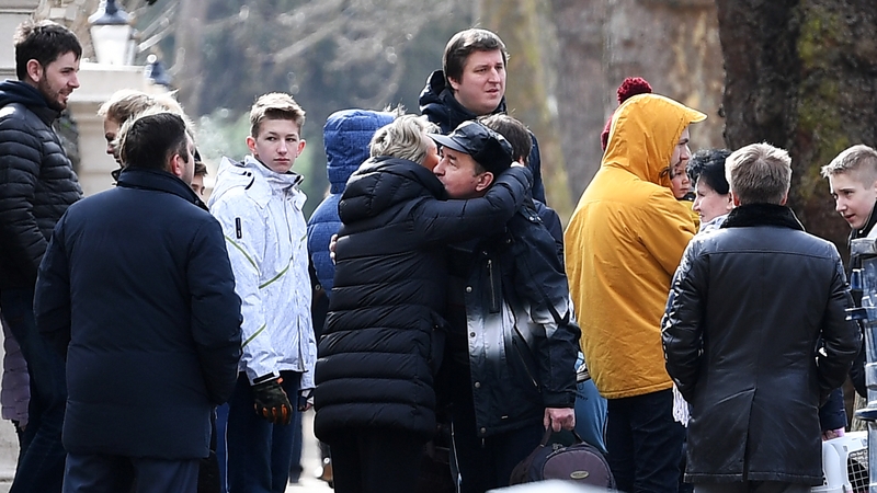 Russian diplomats and their families prepare to leave the embassy in London