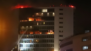 The fire started on the building's 13th floor before spreading to surrounding floors