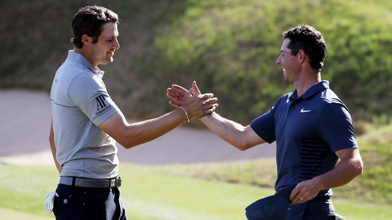 Rory McIlroy congratulates Peter Uihlein