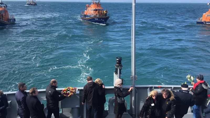 Relatives at the wreath laying service at sea