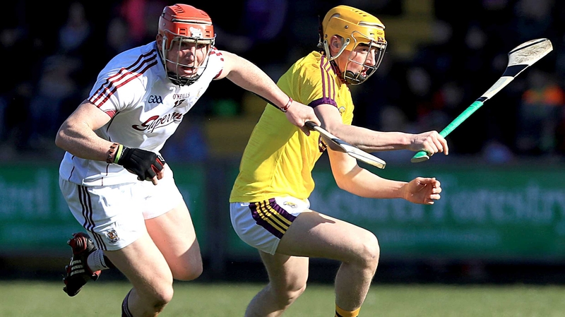 Galway's Conor Whelan with Damien Reck of Wexford
