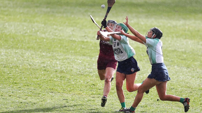 Slaughtneil's Denise McGuigan with Sarah Spellman and Niamh McGrath of Sarsfields