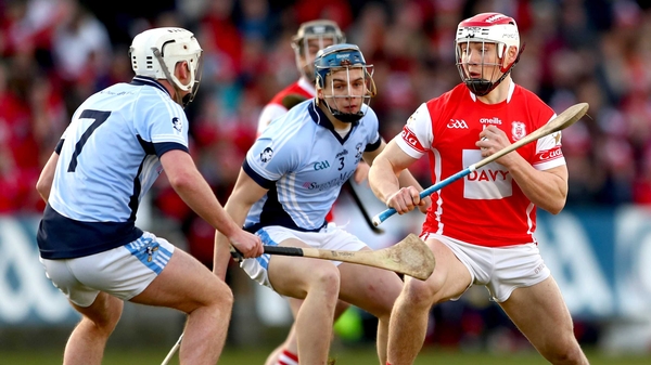 Na Piarsaigh's Kieran Kennedy and Mike Casey tackle Con O'Callaghan of Cuala