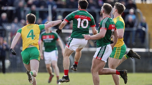 Mayo's Kevin McLoughlin scores the point to tie the game