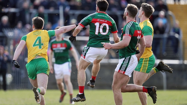 Mayo's Kevin McLoughlin scores the point to tie the game