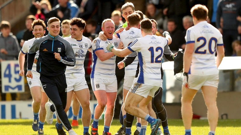 Cavan players celebrate at the final whistle