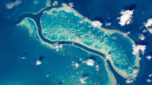 Australia's Great Barrier Reef Marine Park Authority singled out rising sea temperatures as the biggest threat to the giant organism