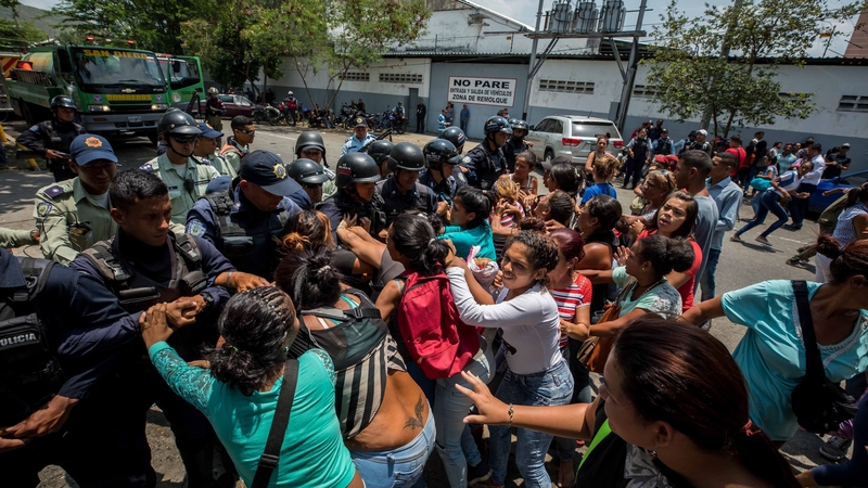 Distressed relatives of detainees gathered outside the jail