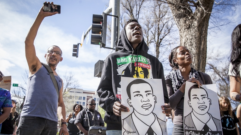 The protesters gathered at city hall before marching into the Old Sacramento part of the city