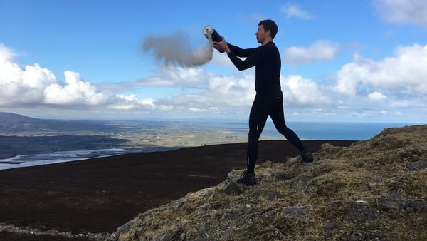 Stan Zamyatin Moore scattering Thom Moore's ashes this afternoon atop Knocknarea, Co Sligo