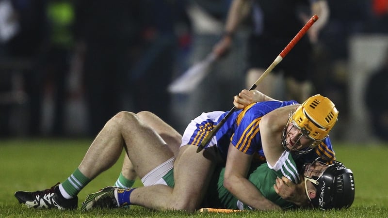 Tipperary's Donagh McGrath and Graeme Mulcahy of Limerick get acquainted during Saturday night's Allianz League semi-final