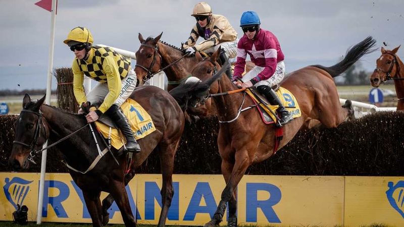 Al Boum Photo, under David Mullins in the yellow and black, on his way to winning The Ryanair Gold Cup