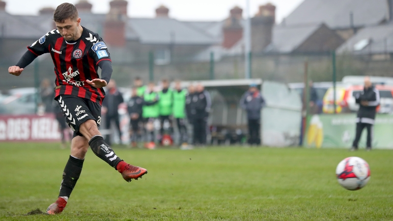 Eoghan Stokes scores the decisive penalty