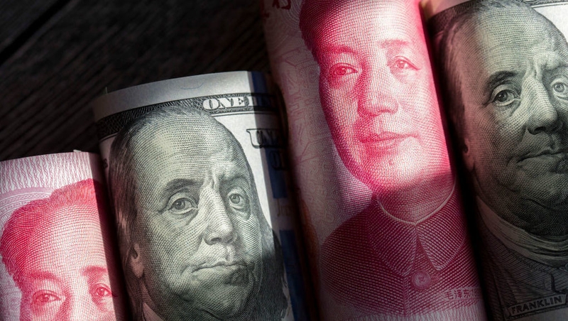 China allowed the yuan to fall below seven to the dollar for the first time in about a decade yesterday