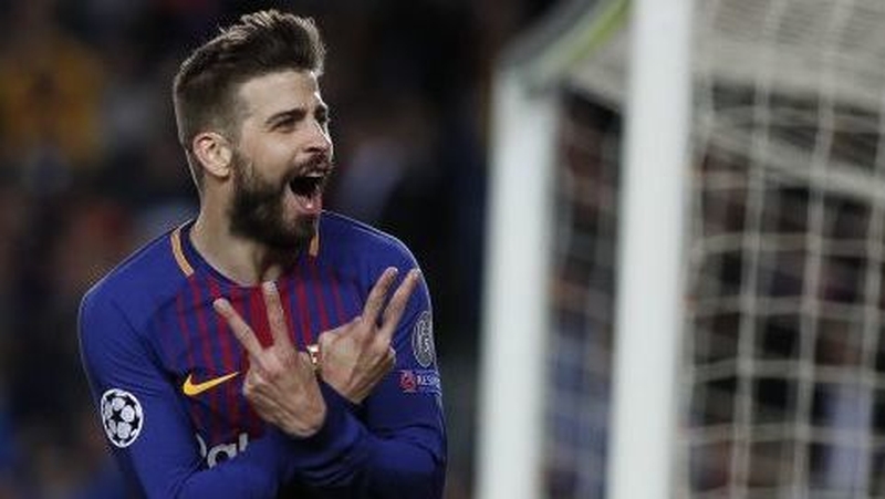 Barca's Gerard Pique celebrates