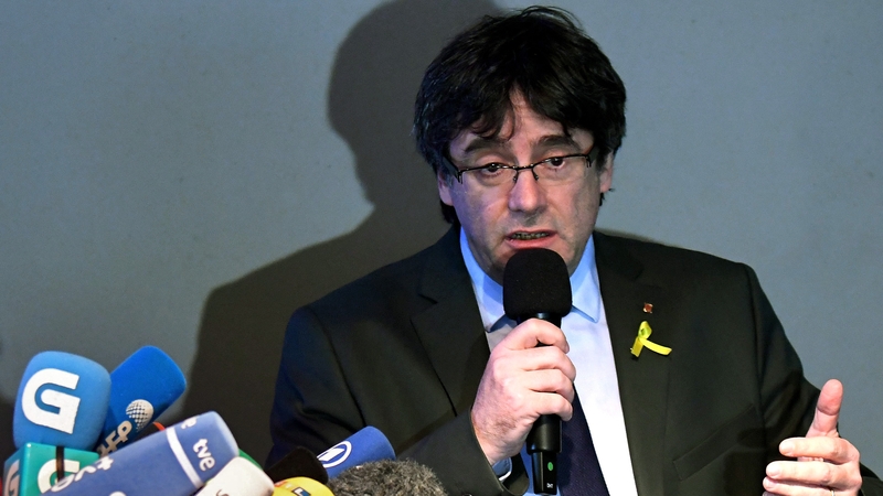 Carles Puigdemont speaking to reporters at a press conference in Berlin