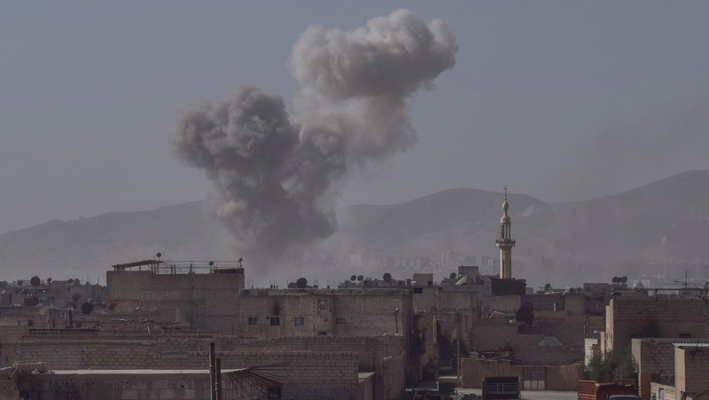 Smoke rises after air strikes at Douma town, Eastern Ghouta