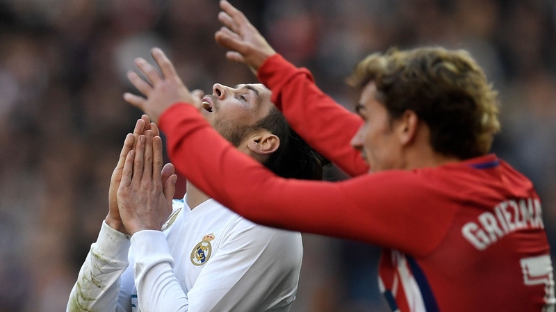 Contrasting emotions for Gareth Bale (L) and Antoine Griezmann