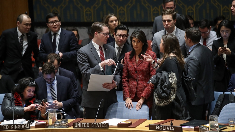 US Ambassador to the UN Nikki Haley (C, red coat) ahead of this evening's meeting