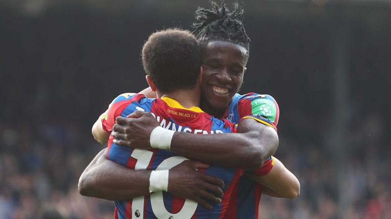 An elated Wilf Zaha celebrates after Crystal Palace's crucial win