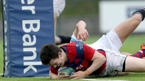 Clontarf's Hugh Sullivan scores a try