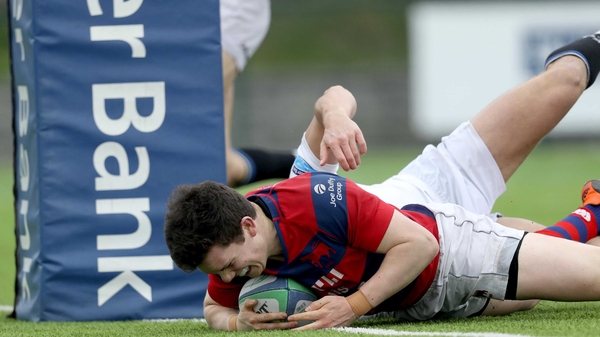 Clontarf's Hugh Sullivan scores a try