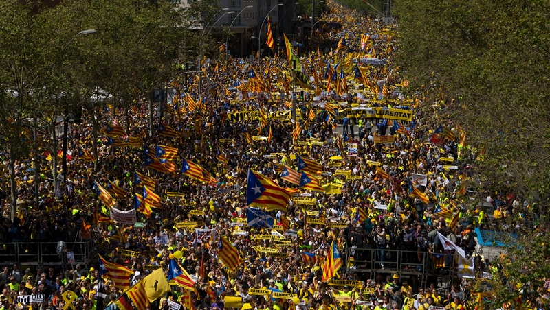 Demonstrators clogged several main city arteries waving flags and wearing yellow