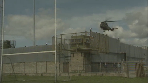 A British army helicopter lands at a base right beside Crossmaglen Rangers' pitch in Armagh
