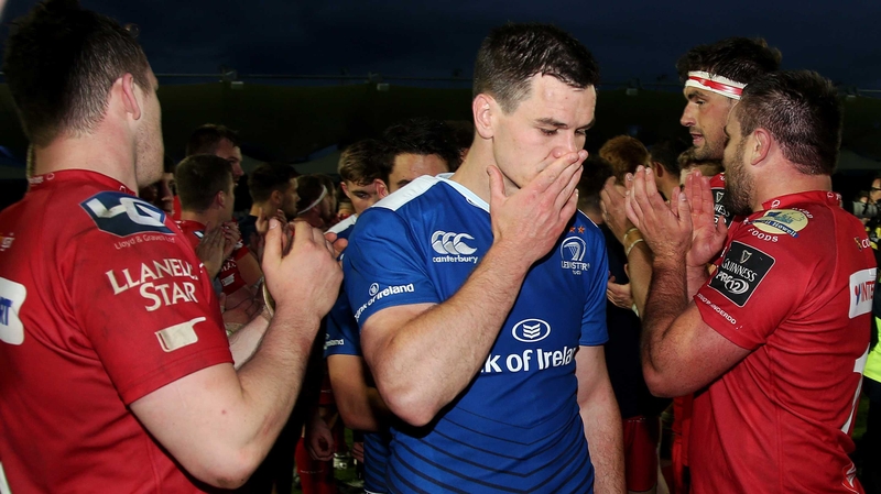 A dejected Johnny Sexton leaves the RDS pitch after last year's Pro12 semi-final defeat to Scarlets