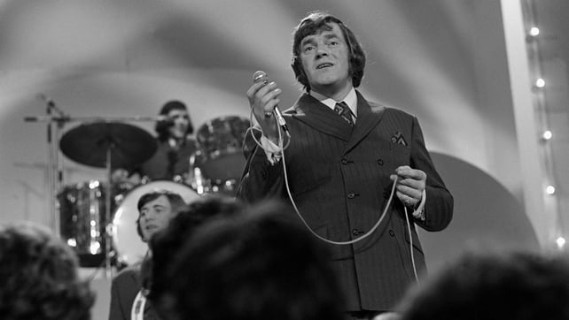 Big Tom performs on stage in Dublin's Cabra Grand Cinema in October 1971. RTÉ Television recorded concerts here and broadcast edited versions in a series called 'Caught in the Act'. Big Tom and The Mainliners appeared in the second episode of the first se
