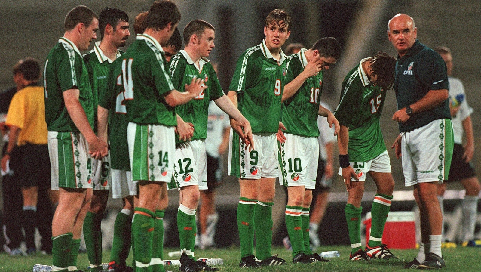 Assistant manager Noel O'Reilly and players during the penalty shoot out