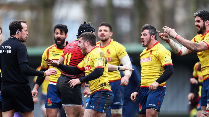 Spain players remonstrate with Romanian referee Vlad Iordachescu