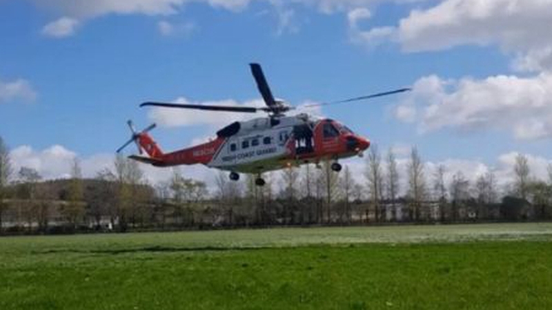 The man was airlifted from the roof of the castle by the crew of Coast Guard (Pics: Cork City Fire Brigade)