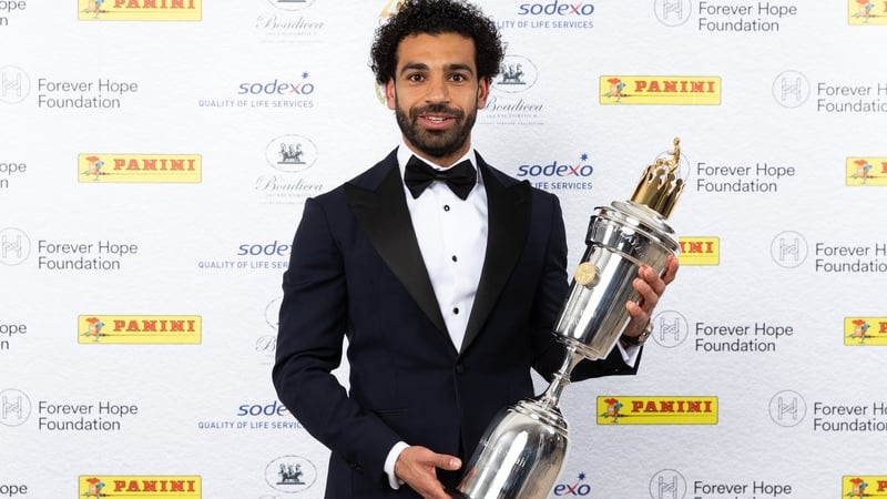 Liverpool's Mohamed Salah poses with the PFA Player Of The Year Award Trophy